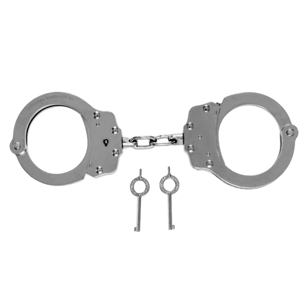 Handcuffs with keys on plain white background