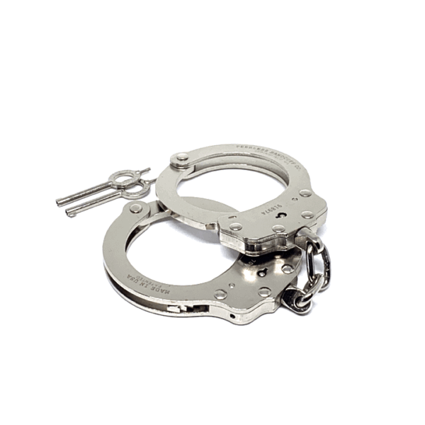 Handcuffs on plain white background